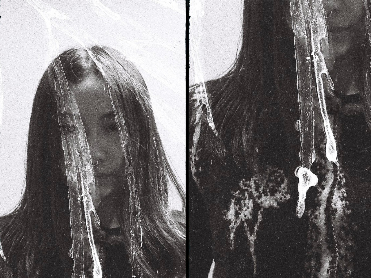 South-east Asian girl in double exposed photographs in black and white.