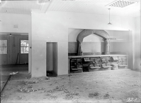 A black and white photograph of the old Gorman House kitchen.