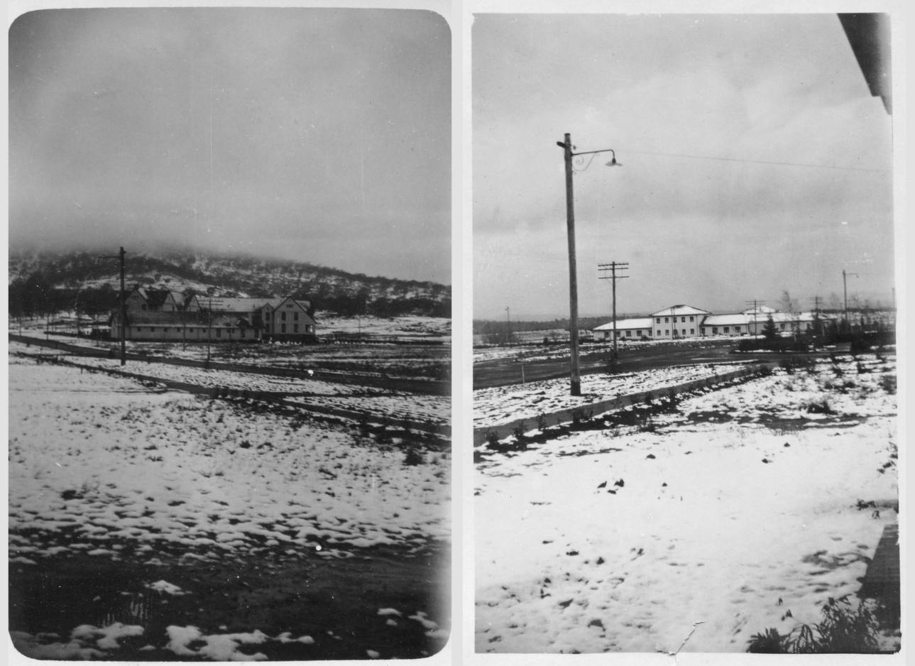 Gorman House sits covered in snow in the distance with snowy roads in the foreground.