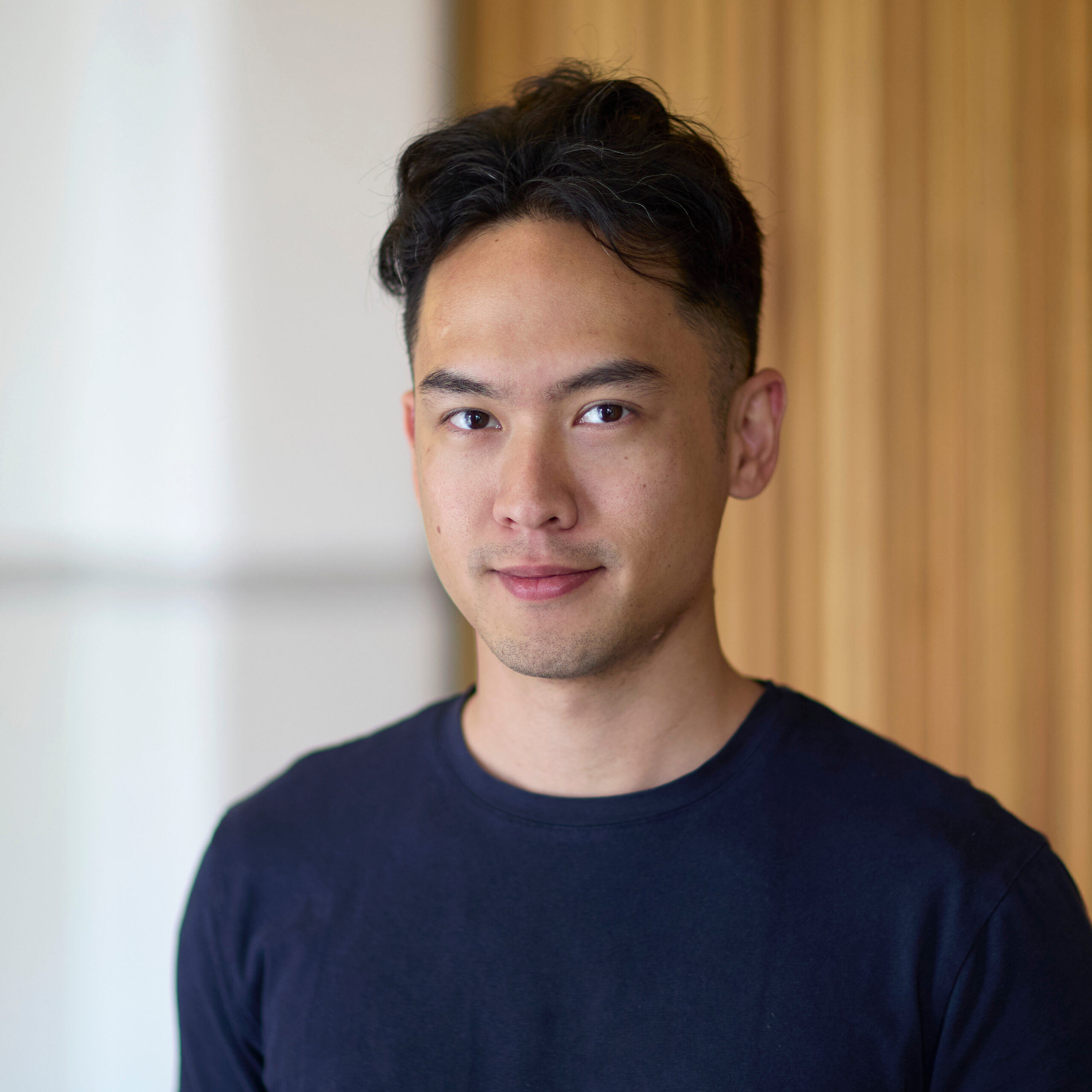 Portrait of Andreo wearing a black t shirt